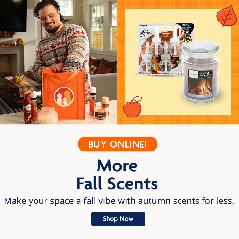 A man taking scented candles and sprays from a Family Dollar shopping